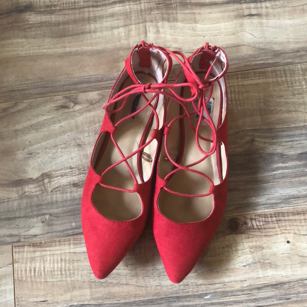 Red lace up Express flats with zipper